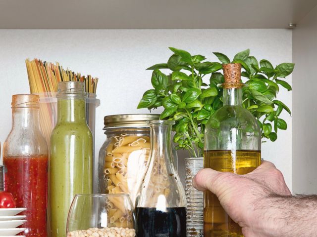 Kitchen pantry with italian food products. Healthy food concept.